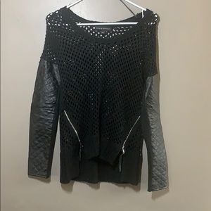 Black cable knit sweater with faux leather sleeves